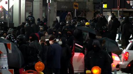 Protesters gather in Tacoma as an officer who drove into a
crowd is placed on administrative leave 1