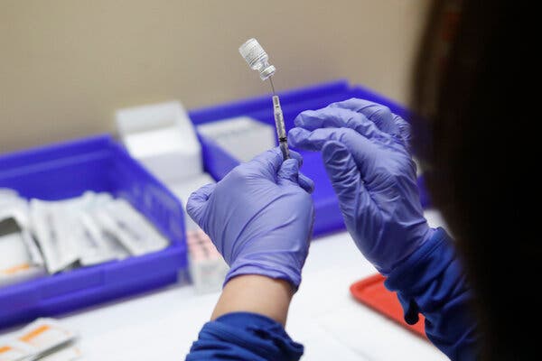 Pfizer Will Ship Fewer Covid-19 Vaccine Vials to Account for
‘Extra’ Doses 1