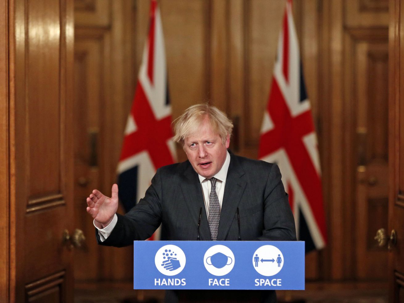 UK warns of more lockdown measures as new coronavirus
variant spurs outbreak 1
