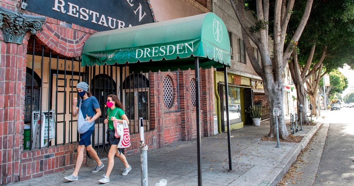 Despite Mask Mandate and Strict Stay-at-Home Orders, Los
Angeles County First to Hit Grim COVID Milestone 1