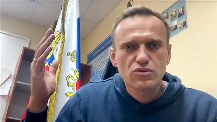 Hundreds detained as protests called by Putin foe erupt
across Russia 1