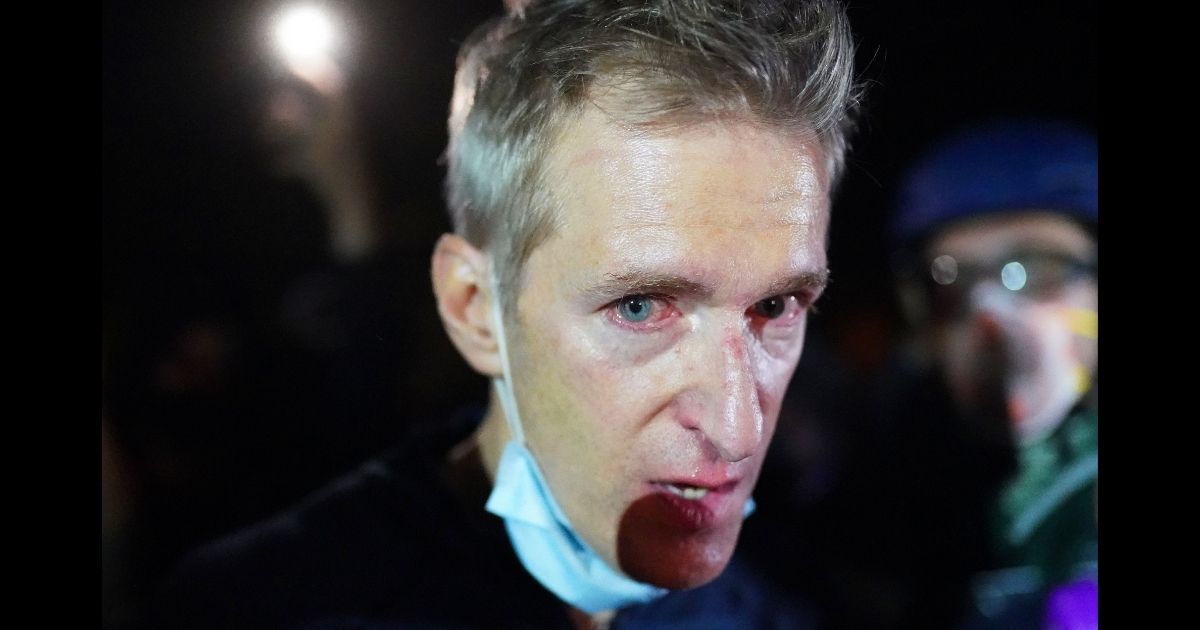 Portland Mayor Pepper-Sprays Maskless Constituent Accusing
Him of Disregarding COVID Measures 1