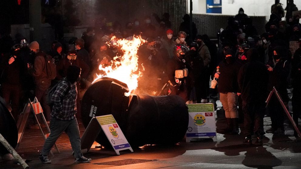 Protest erupts over police car driving through crowd 1