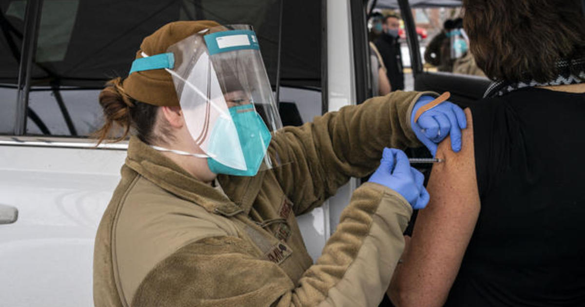 Biden ups vaccination goals as part of new COVID-19
plans 1