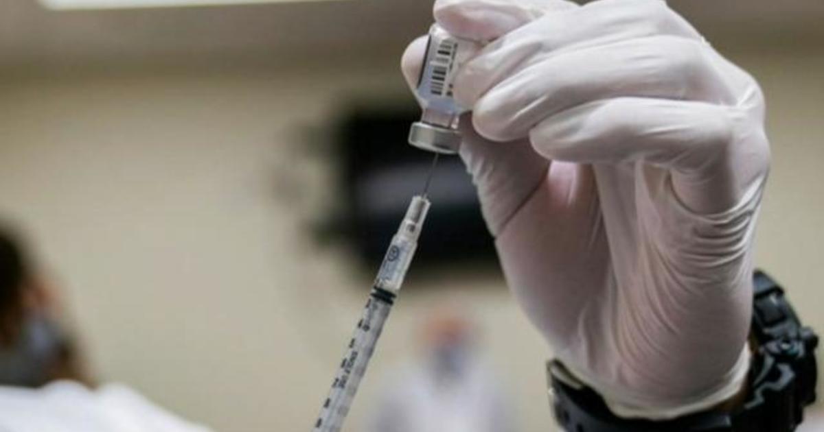 U.S. works to get more COVID-19 vaccine doses amid concerns
over new variant 1