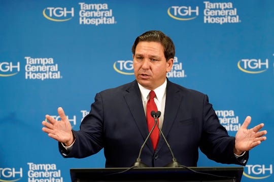 Florida Gov. Ron DeSantis spars with CNN reporter over
state's COVID-19 vaccine rollout, blames hospital officials in one
county 1