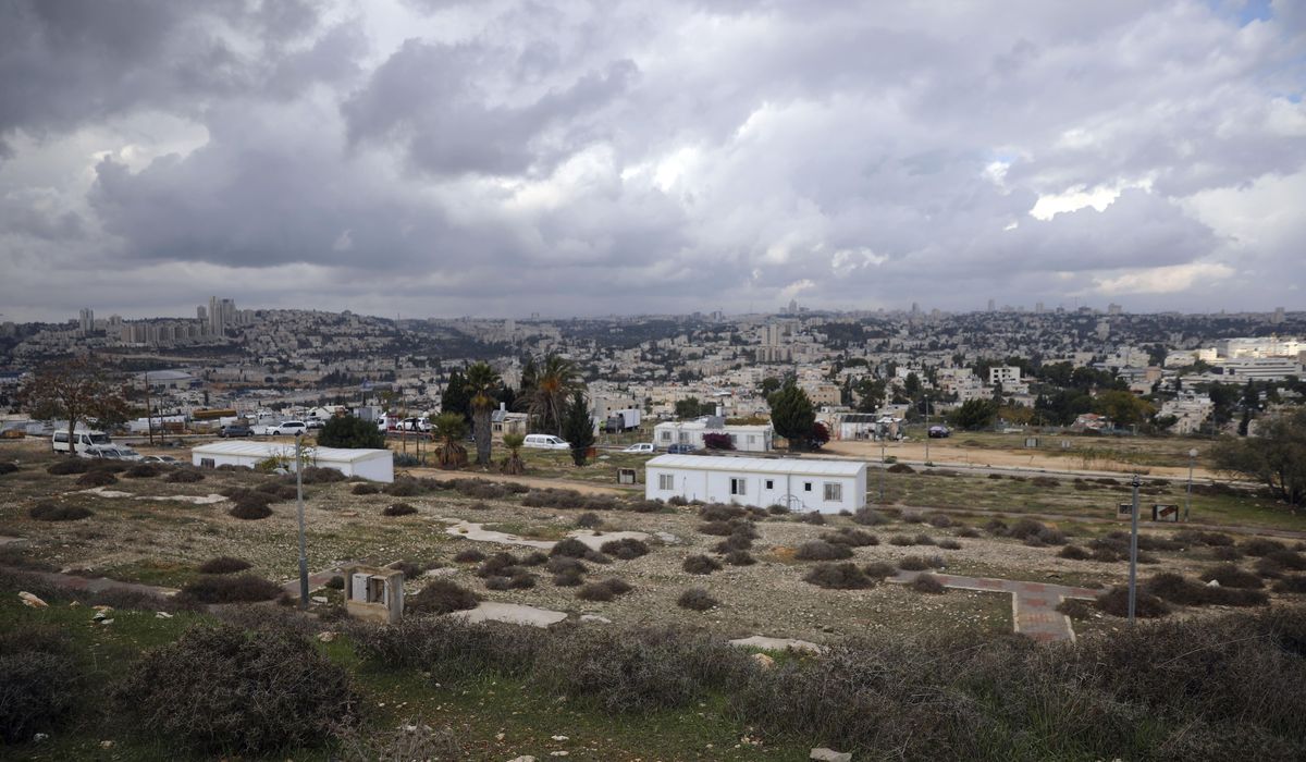 Israel pushes settlement construction as Trump leaves
office 1