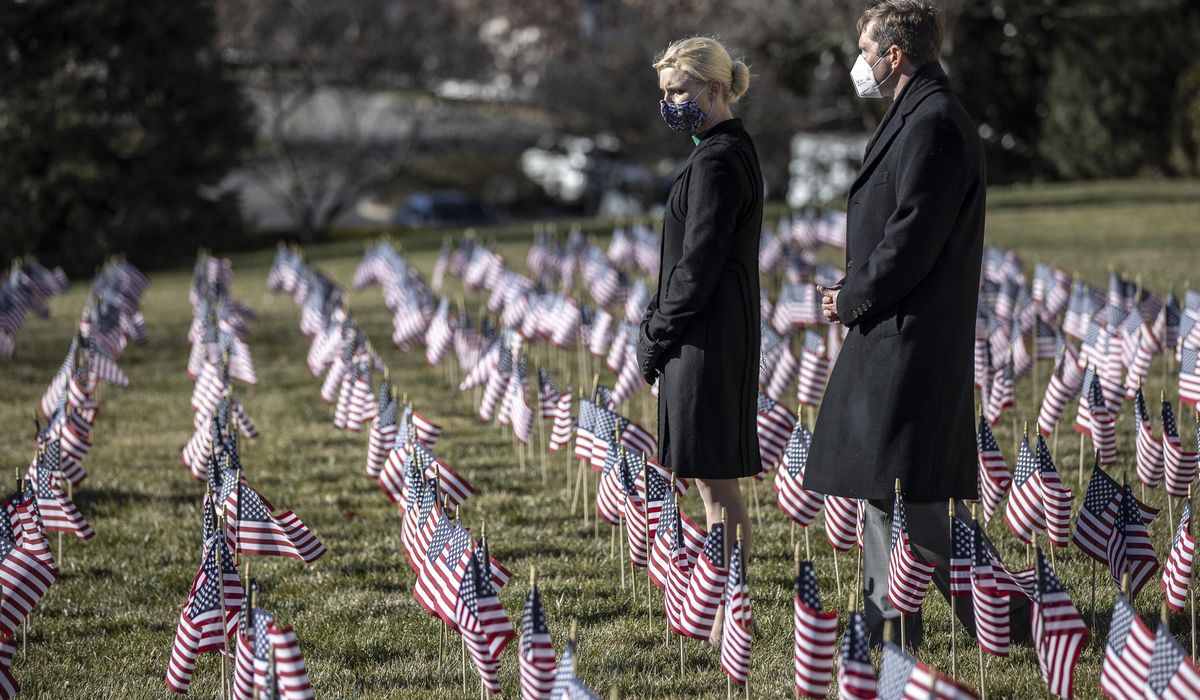 Kentucky remembers COVID-19 deaths with statehouse
ceremony 1