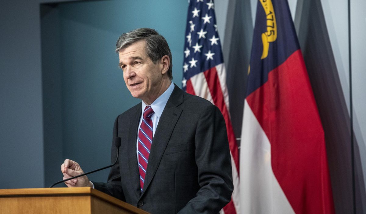 Cooper extends curfew as GOP questions COVID-19 vaccine
plan 1