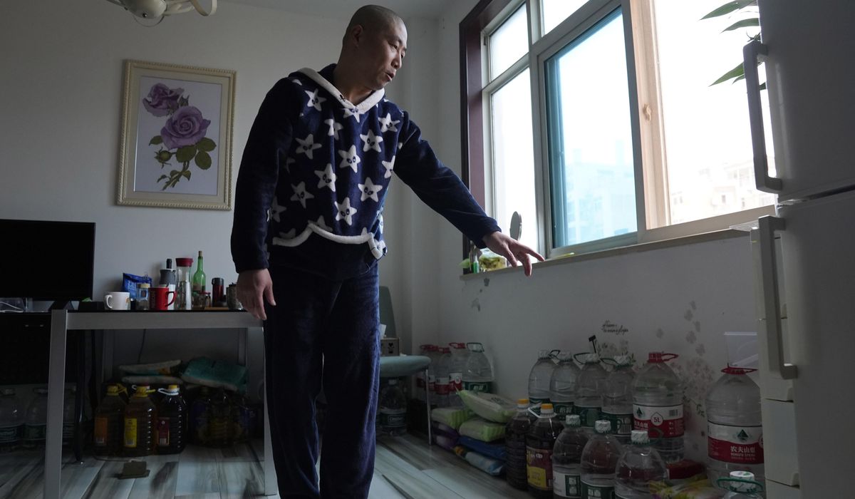Year after lockdown, Wuhan dissident more isolated than
ever 1