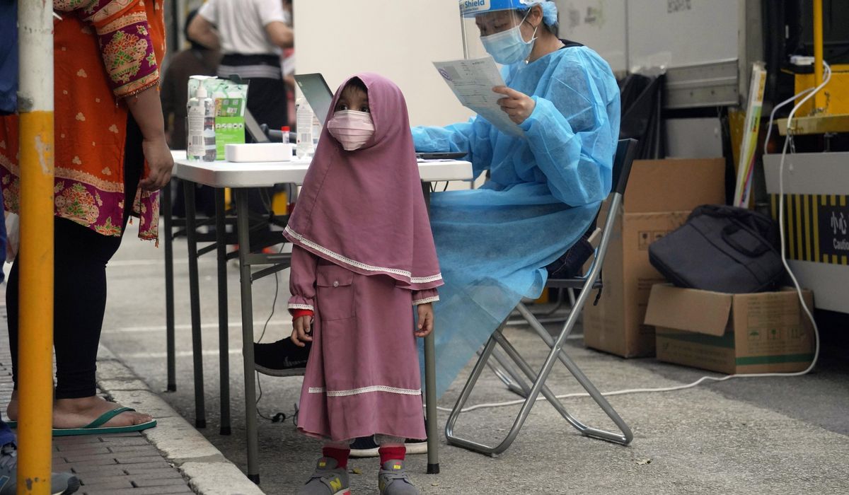Thousands of Hong Kongers locked down to contain
coronavirus 1