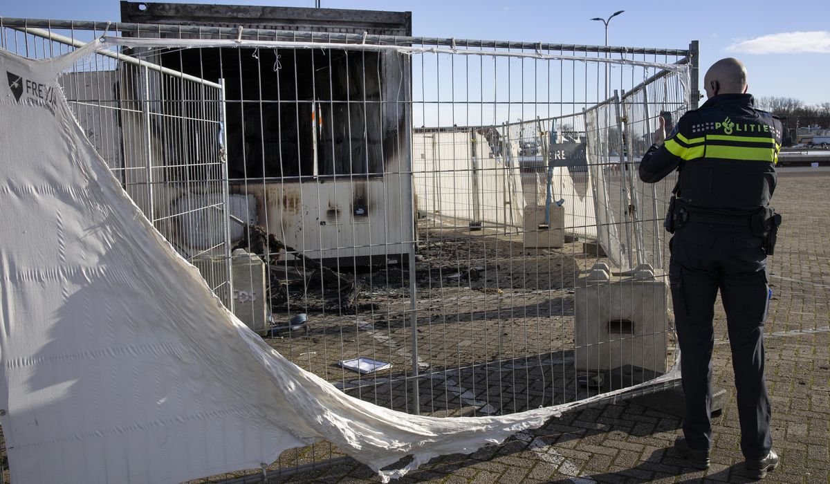 Rioting youths in Dutch village torch virus testing
center 1