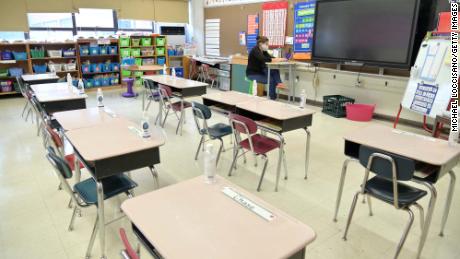 Open a window to reduce virus spread, CDC tells
schools 1