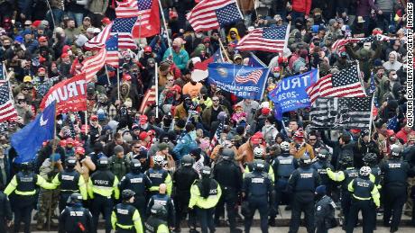 NYPD launches internal review of 2 officers after names
appear in leaked data apparently belonging to the Oath
Keepers 1