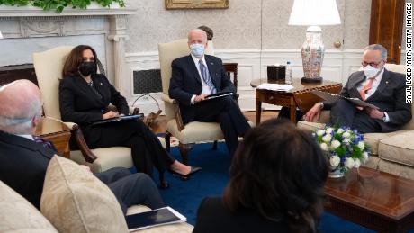 Analysis: A month into office, Biden seeks to reassure on
the pandemic at home and abroad 1