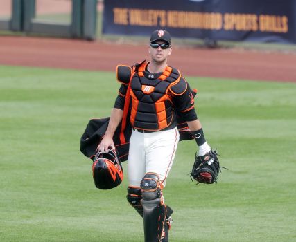Buster Posey shines, fans return to Scottsdale Stadium,
Giants lose Cactus League opener 1