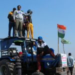 Tens of thousands of farmers protest agriculture laws with
blockades across India 6