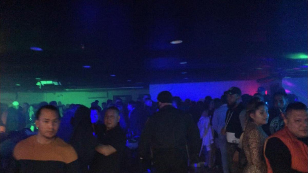 Hundreds of maskless partiers busted at underground Queens
club 1