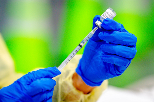 Why COVID-19 vaccines could make us mask-free and
huggable 1
