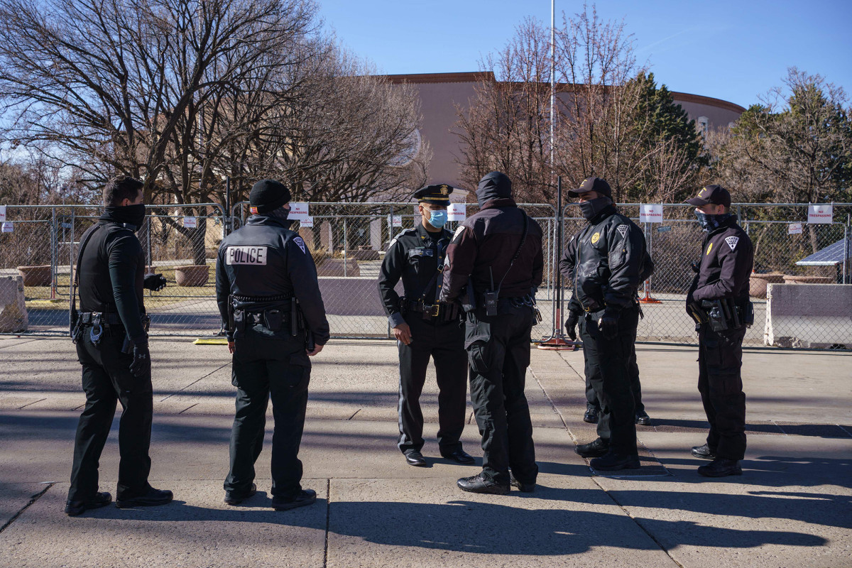 New Mexico State Police officer killed, other cops injured
in shooting 1
