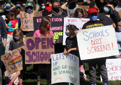 Oakland: Rally downtown seeks to push district to reopen
schools sooner 1
