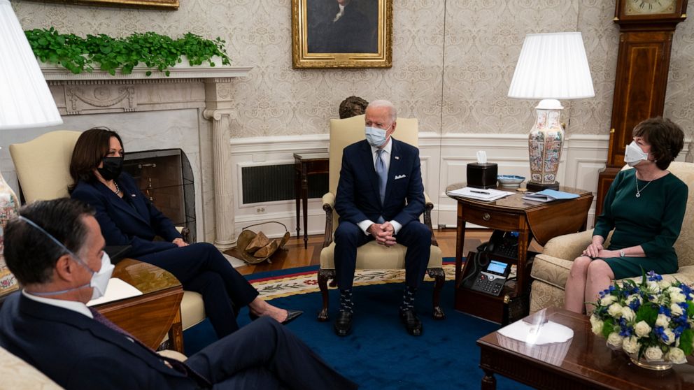 AP-NORC Poll: Americans open to Biden's approach to
crises 1