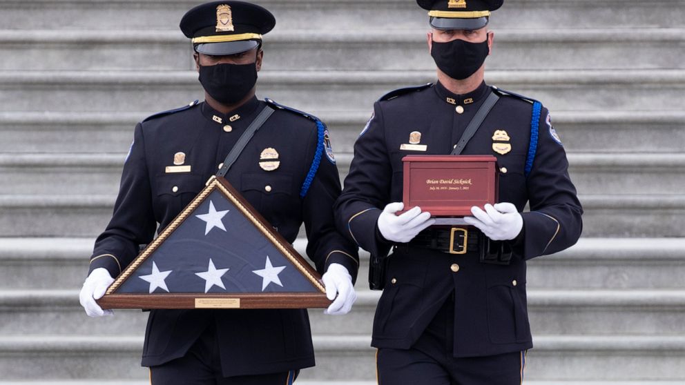 AP sources: Feds pinpoint suspect in officer's riot
death 1