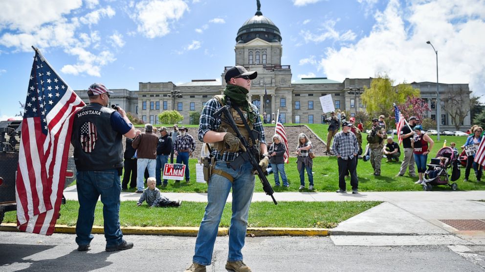 States remain split on guns in capitols after armed
protests 1