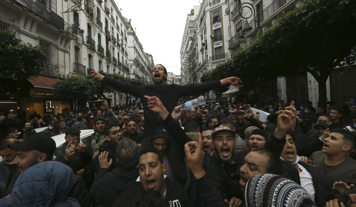 Thousands of Algerian activists mark second year of
protest 1
