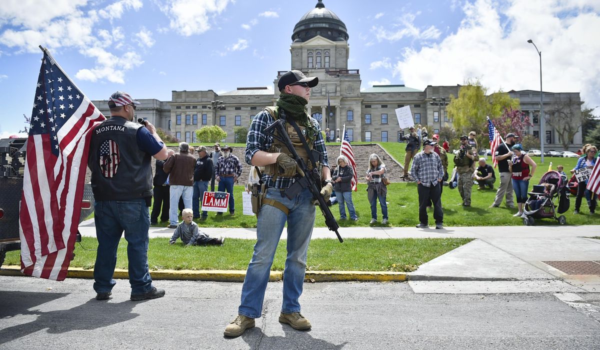 States remain split on guns in capitols after armed
protests 1