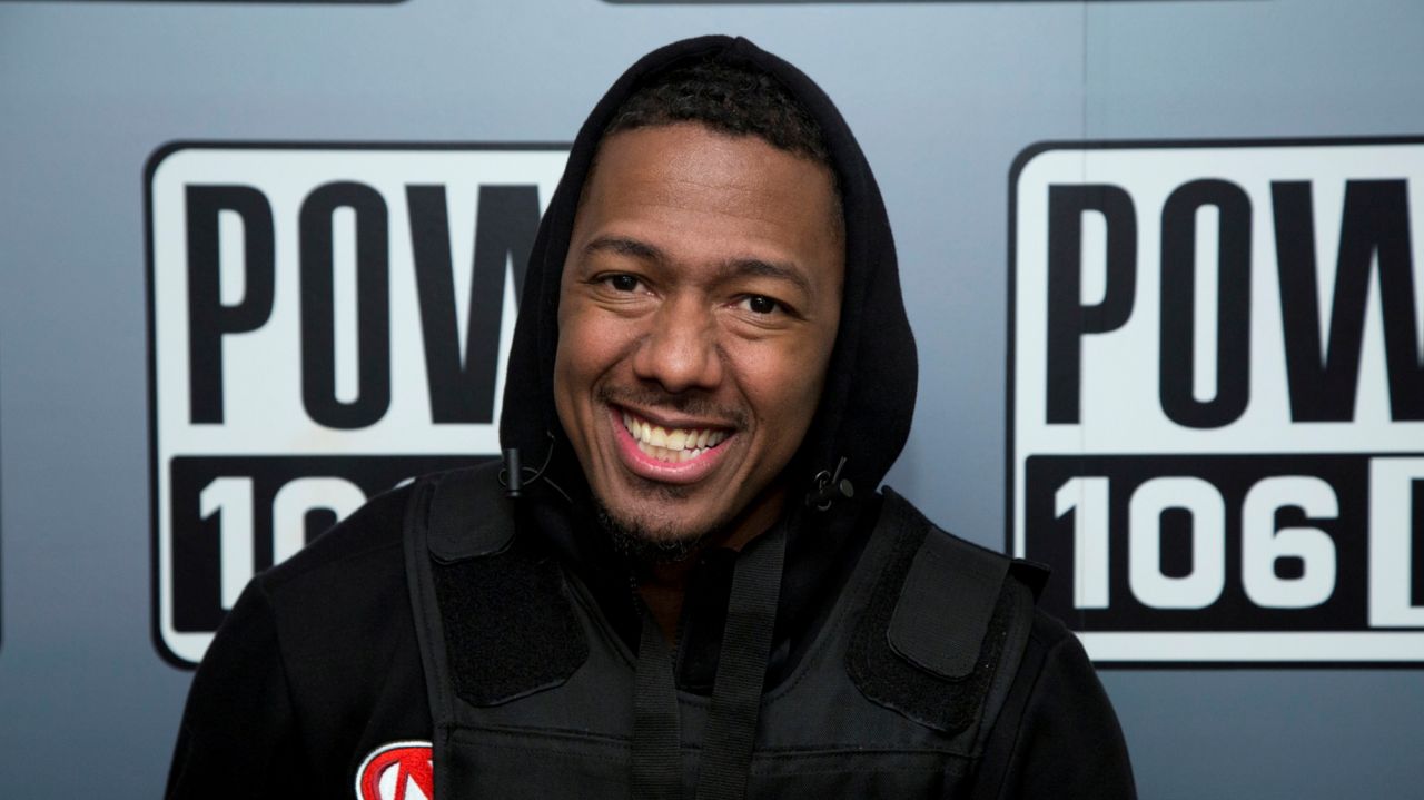 Nick Cannon has COVID-19, will take leave from 'The Masked
Singer' 1