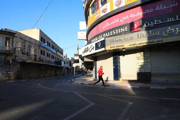 Palestinians Go Into New Lockdown While Awaiting
Vaccines 1