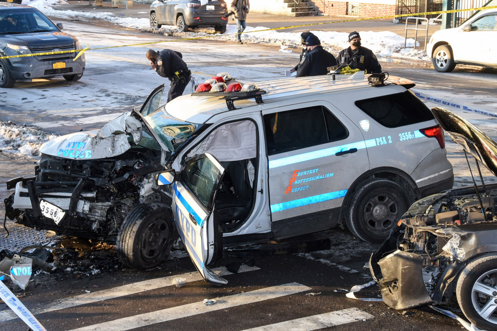 Two NYPD officers injured in collision with livery car in
Brooklyn 1