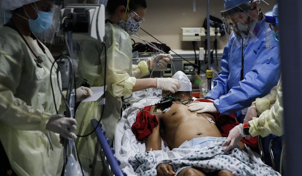 Things to Know: US COVID-19 death toll at brink of
500,000 1
