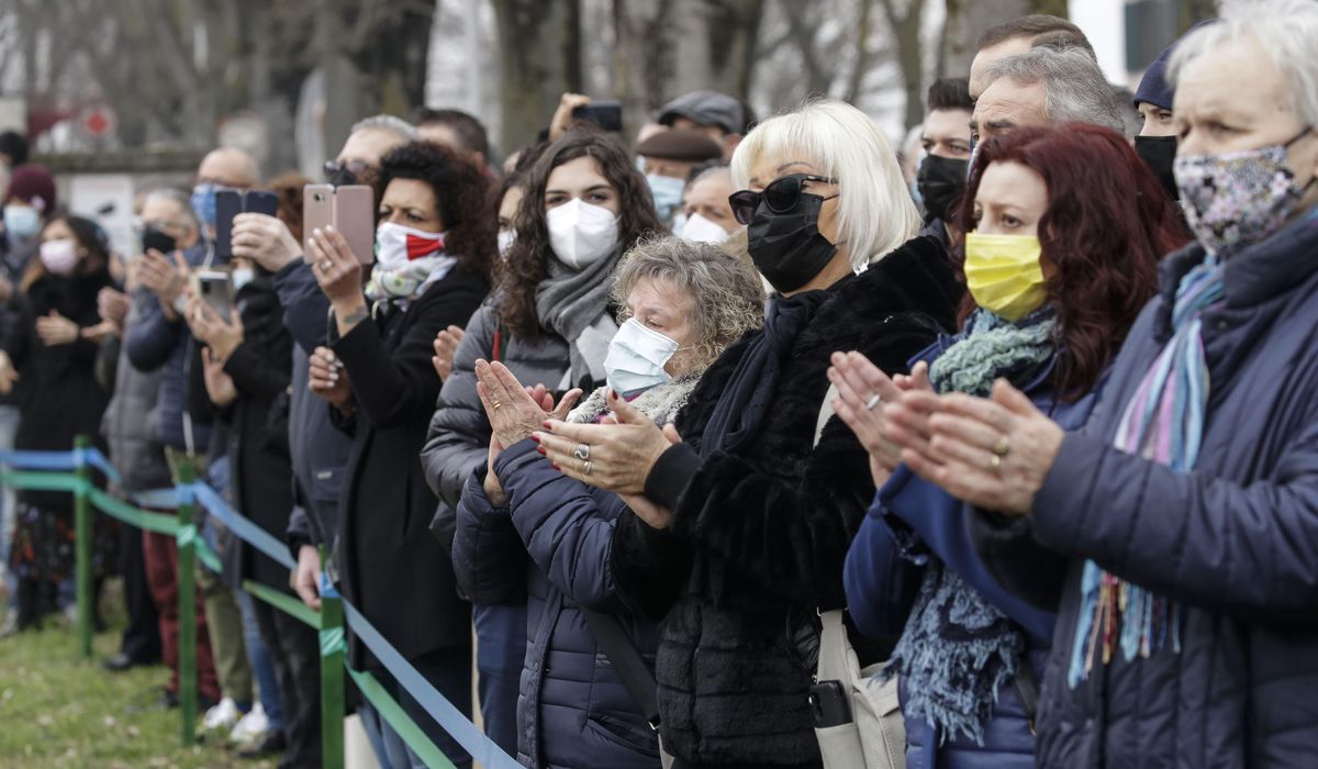 With heavy hearts, Italians mark year of COVID-19
outbreak 1