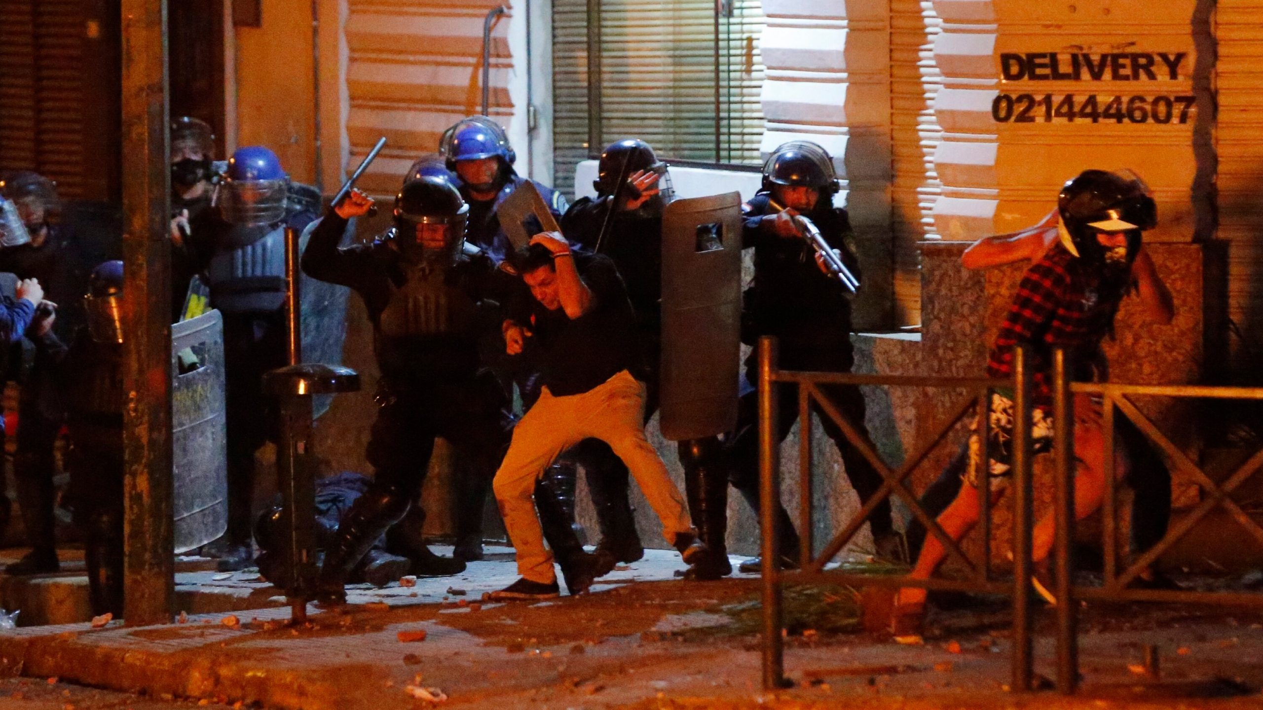 Protesters and Police Clash in Paraguay Amid Anger Over
Pandemic Response 1