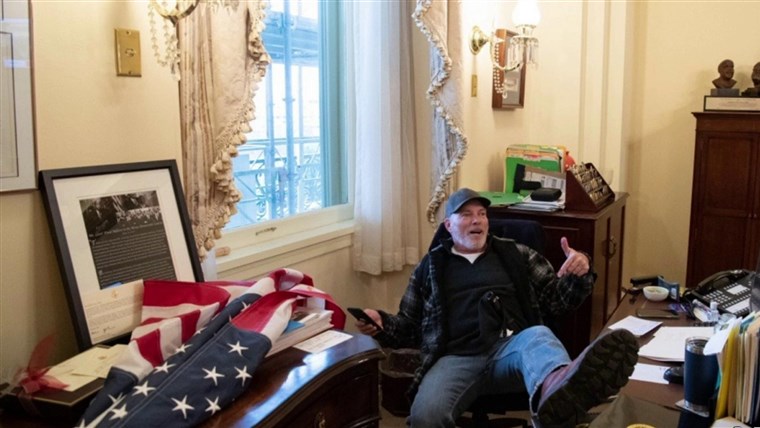 'Not fair!': Man who put feet on Pelosi's desk has outburst
at court hearing for Capitol riot 1