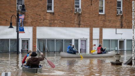 Covid-19 vaccines needed to be rescued by boat as heavy rain
caused flooding in Kentucky 1