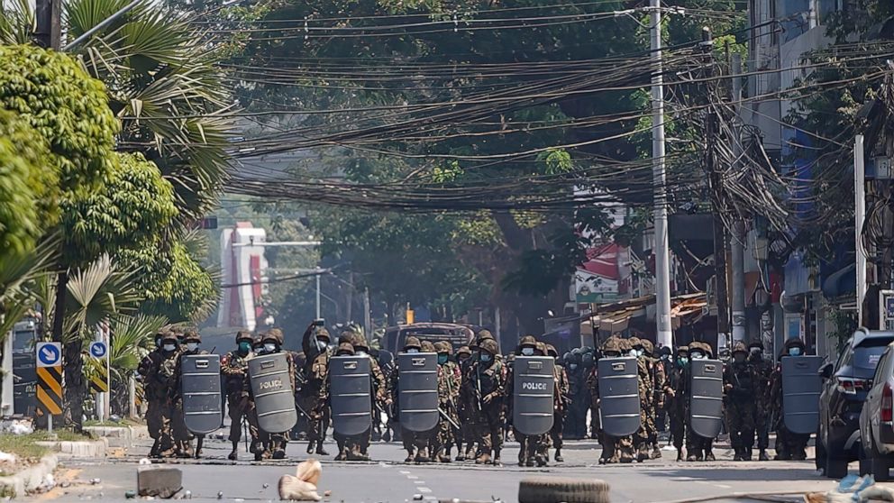 Myanmar police fire tear gas, rubber bullets at
protesters 1