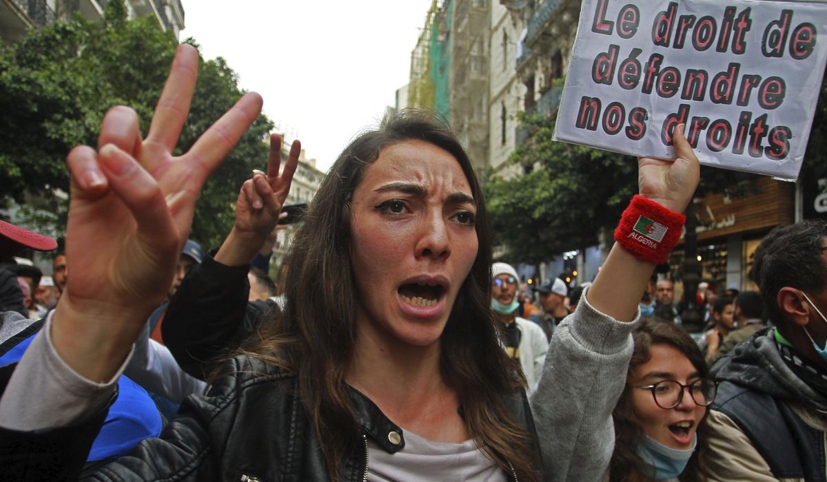Algerian students restart weekly protests cut off by
virus 1