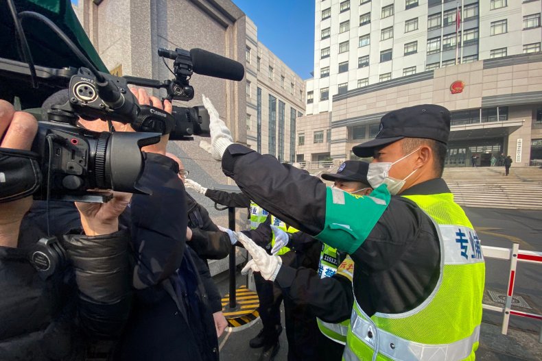 China Harassing, Intimidating Journalists With Surveillance
Built to Curb COVID-19 1
