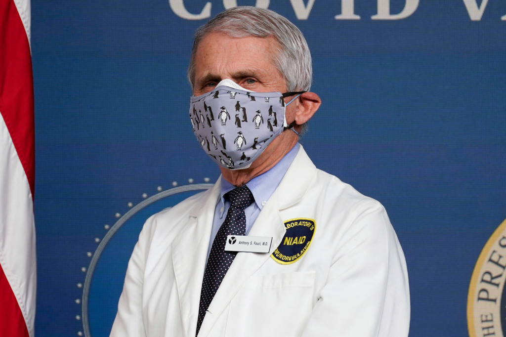 Dr. Fauci warns of COVID-19 spike in coming weeks, even with
more vaccine doses 1