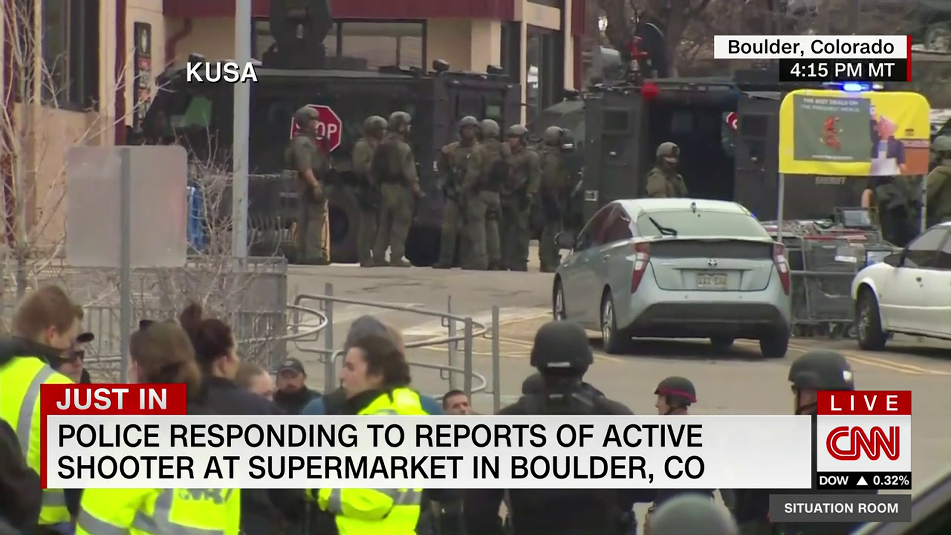 Shirtless man taken by officers from Boulder
supermarket 1