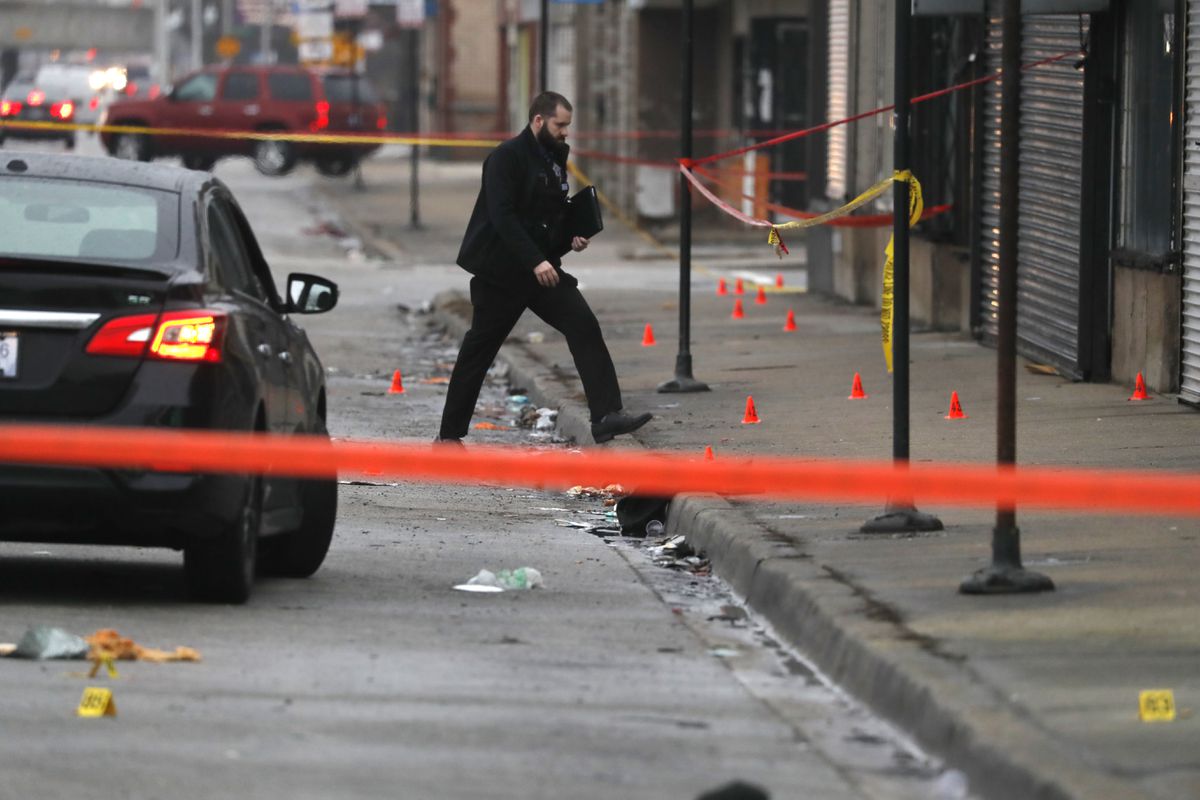 1 killed, at least 7 wounded after gunmen open fire into
crowd in Chicago: police 1 1 killed, at least 7 wounded after gunmen open fire into
crowd in Chicago: police 1