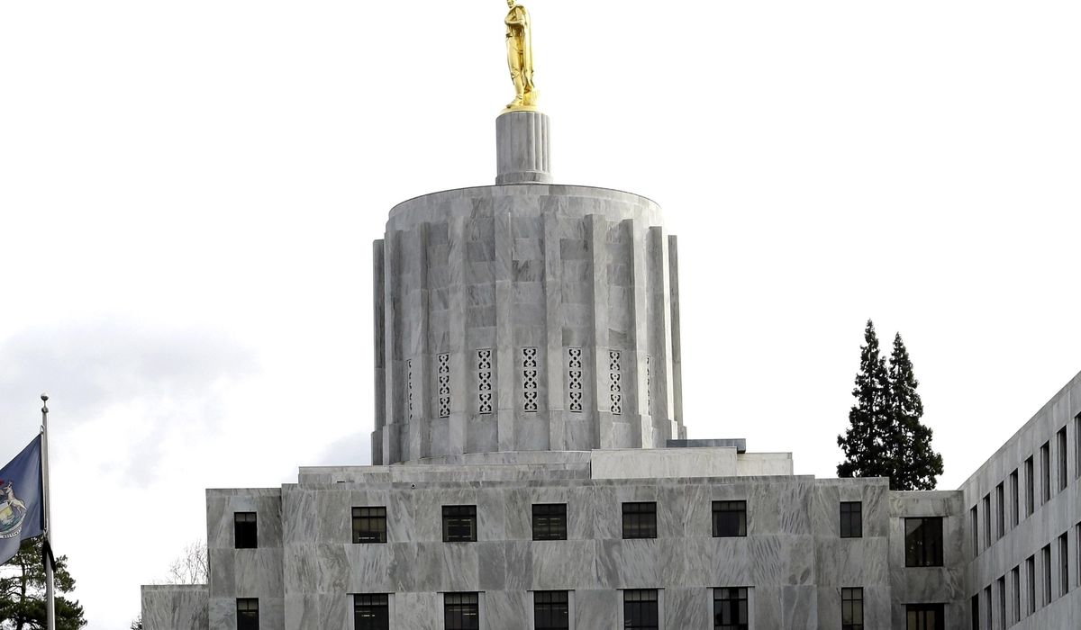 Three arrested in Oregon as 'heavily armed' Antifa protest
turns violent 1