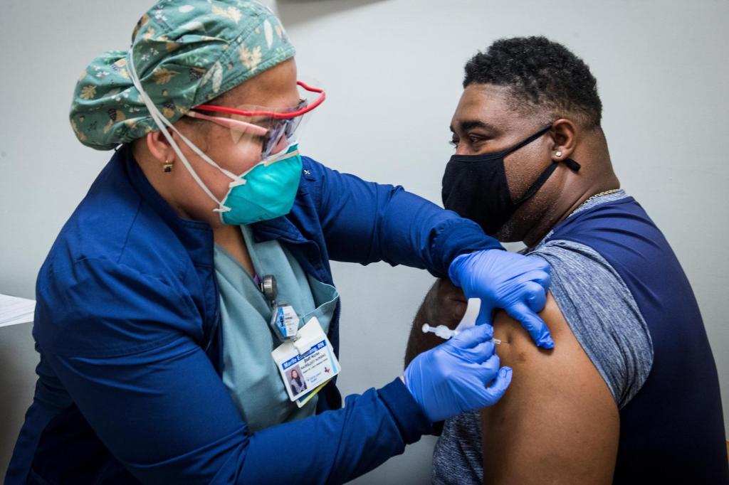 More than a dozen states to open COVID-19 vaccines to all
adults 1