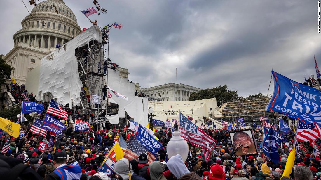 Mother of police officer injured in Capitol riot says she's
outraged by Trump's lie that his supporters were 'hugging and
kissing' cops during attack 1