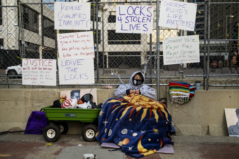 Teacher Seeks Justice for George Floyd, Chains Herself to
Fence Outside Derek Chauvin Trial 1