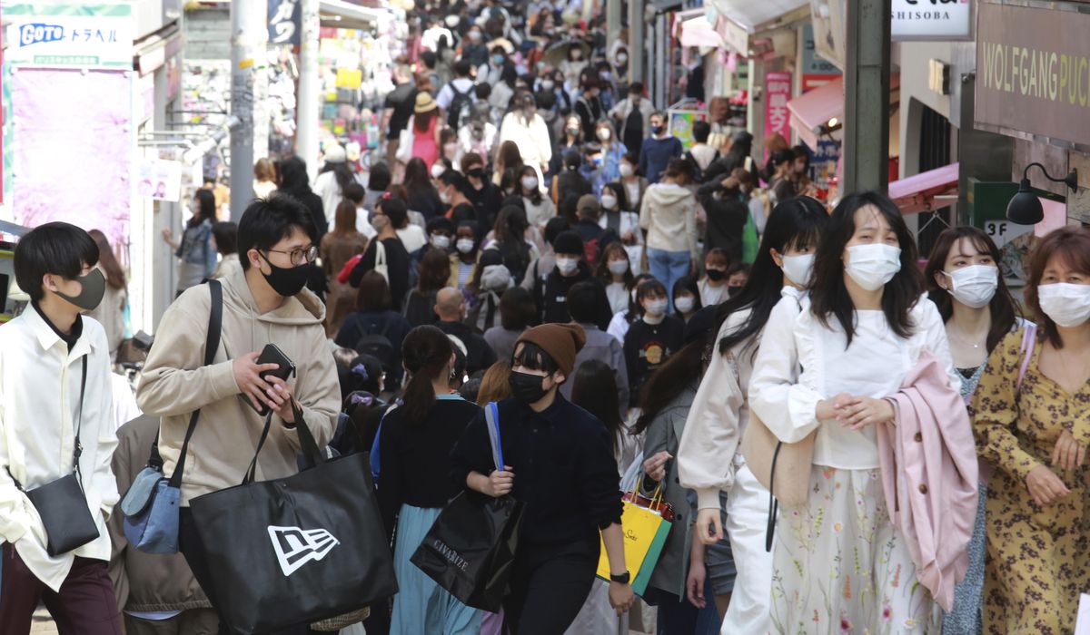 The Latest: Japan wants further probe into COVID-19
origins 1