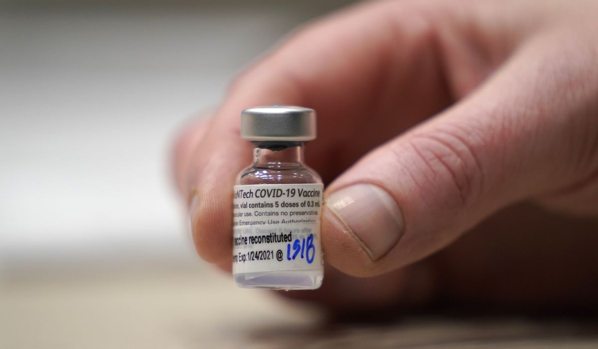 Pfizer says its COVID-19 vaccine protects younger
teens 1